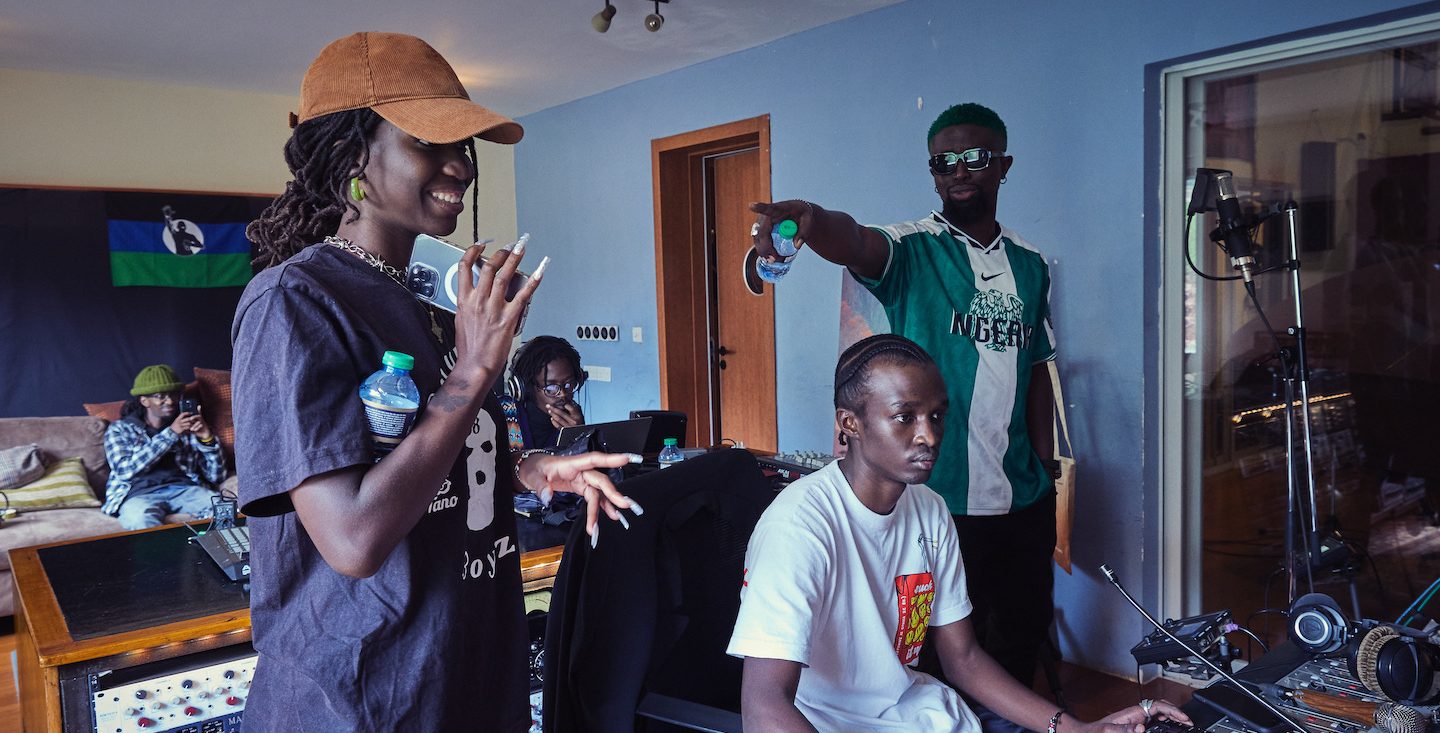 Maya Amolo, Mbryo, and M^3, and Lukorito in the studio working on a song.